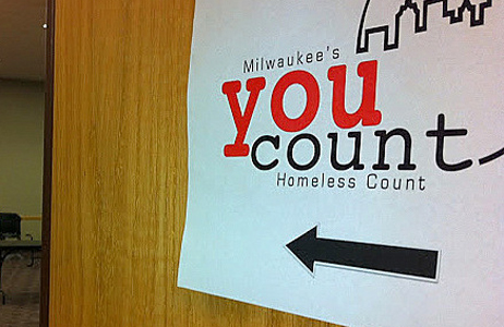 Milwaukee's you count homeless count point in time logo on sign on door